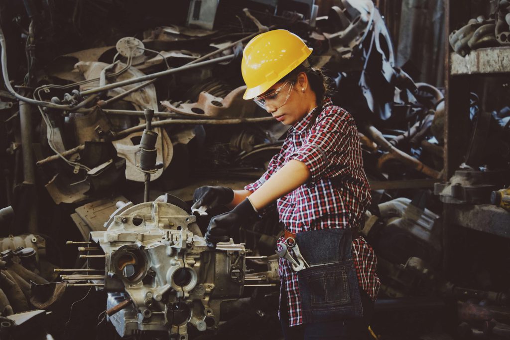 woman using auxiliary engine spare parts